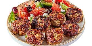 Happy meatballs with greek salad