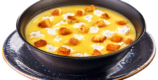 Potato cream soup with cheese